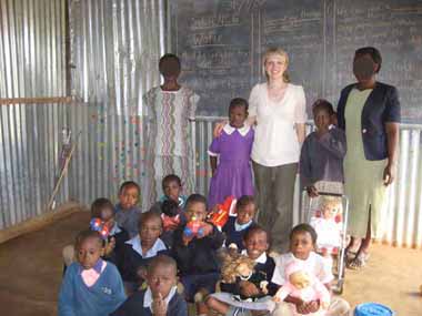 An FKC member with some FKC children in class